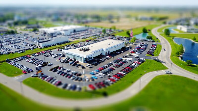 Car dealership forecourt with vehicles for sale in Auckland, New Zealand