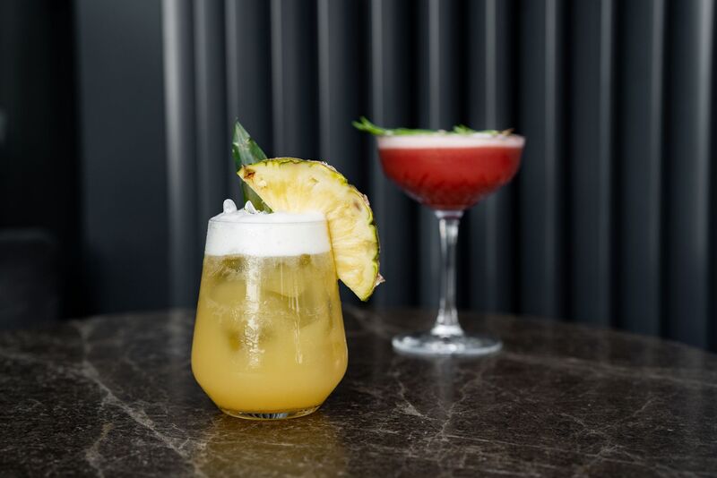Cocktail bar in Auckland preparing drinks for a busy nightlife crowd