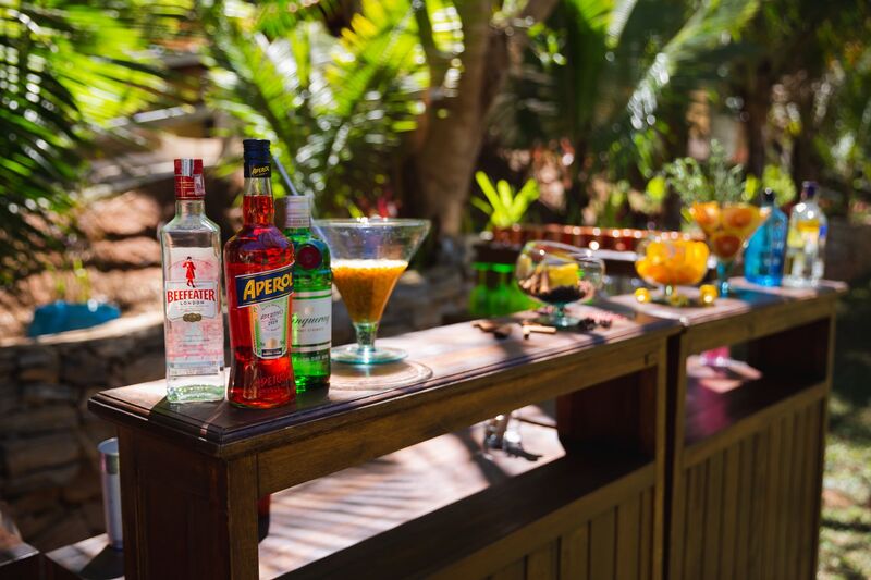 Craft cocktail being served at an Auckland bar counter