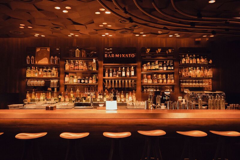 Patrons enjoying drinks at a late-night Auckland nightlife venue