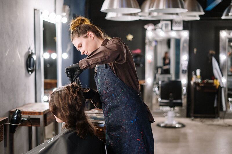 Modern Auckland beauty salon interior with styling stations