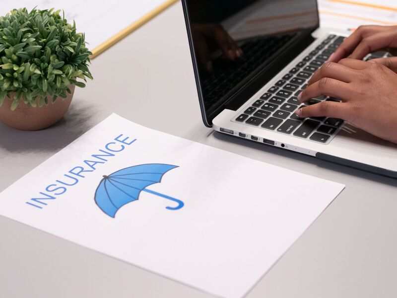 Commercial insurance agency office team advising Auckland business clients
