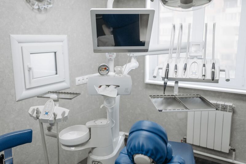 Auckland dentist consulting with a patient about treatment options