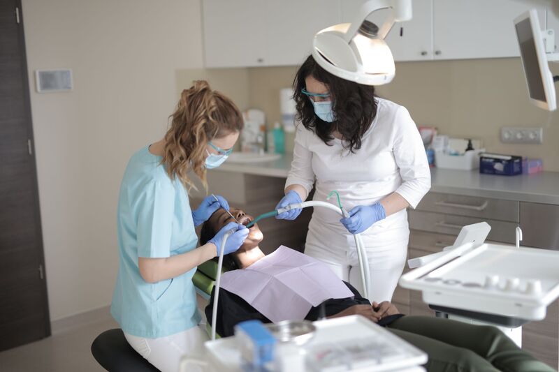 Dentist and patient during a dental appointment at an Auckland clinic