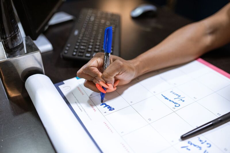 Auckland event planner arranging details for a corporate function and celebration