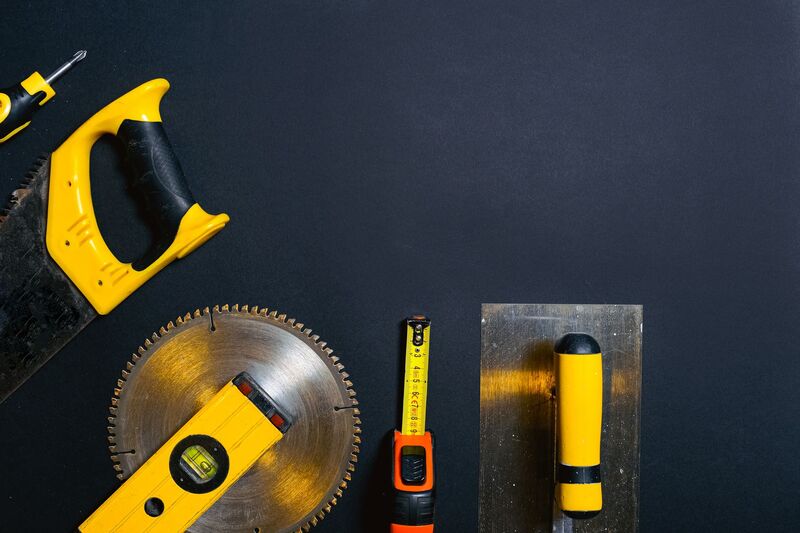 Auckland handyman fixing a home repair job with power tools