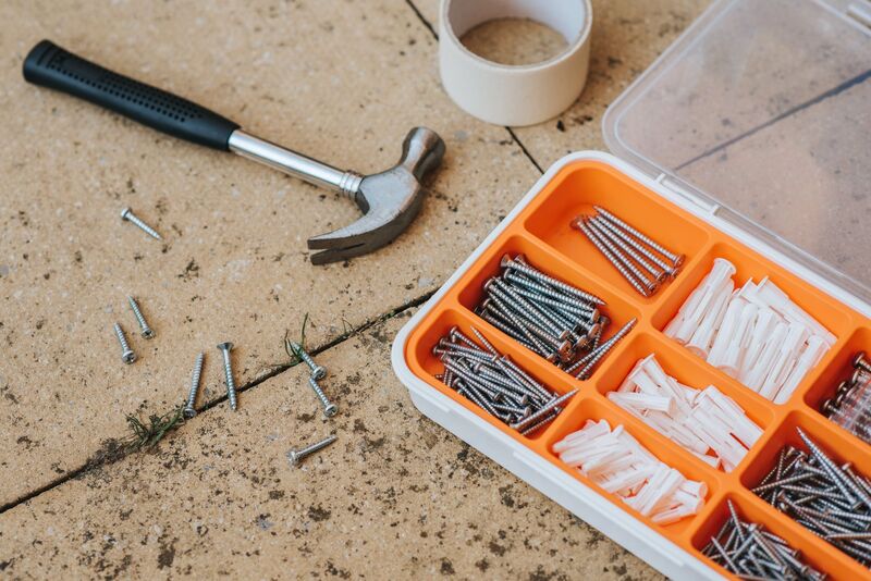 Close-up of handyman tools and hardware used on Auckland home repairs