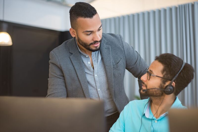 IT support technician helping an Auckland business client