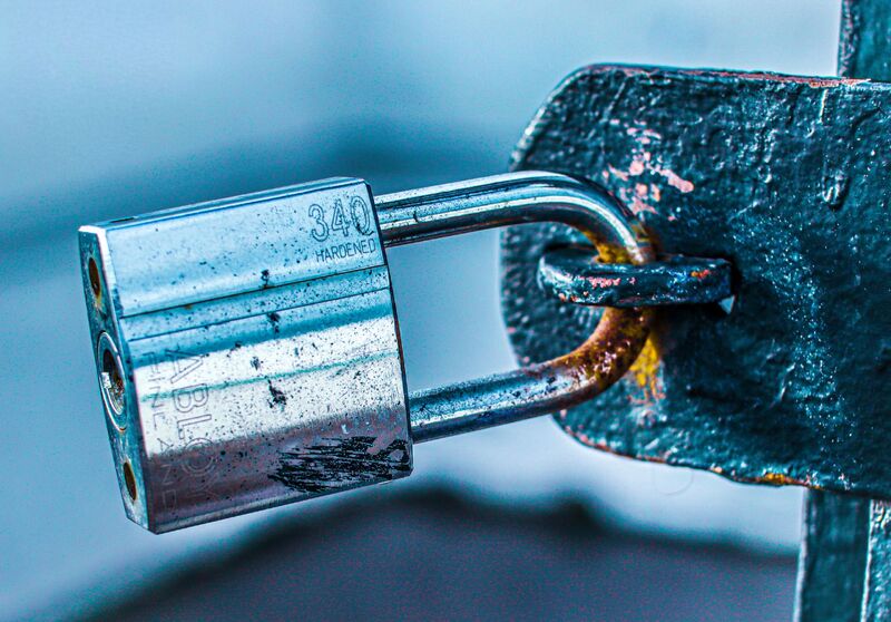 Close-up of a locksmith cutting a replacement key in Auckland
