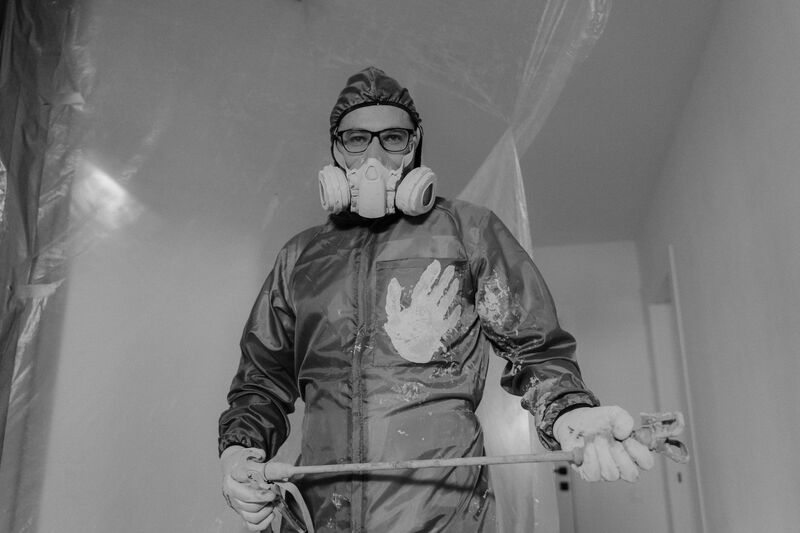 Auckland house painter preparing to paint exterior weatherboard cladding