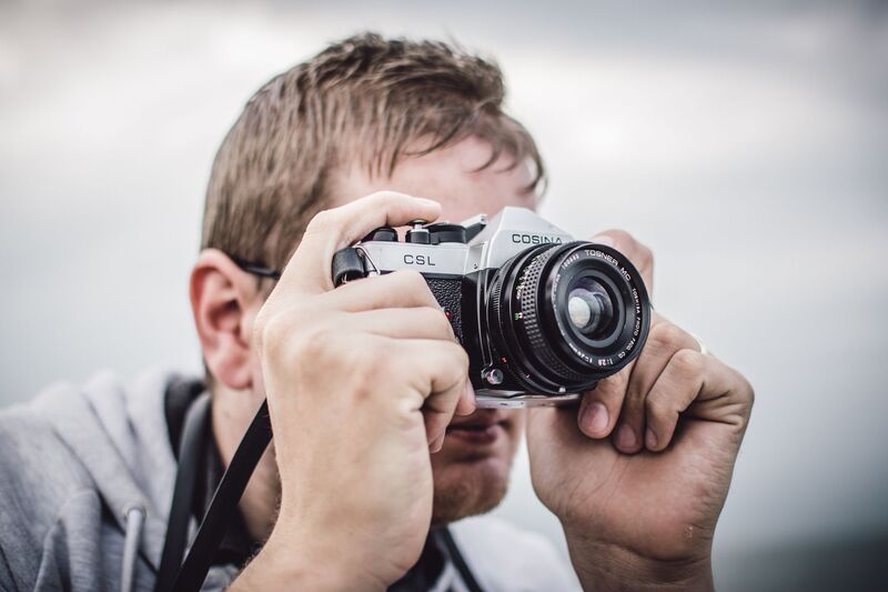 Wedding photographer capturing a ceremony in Auckland