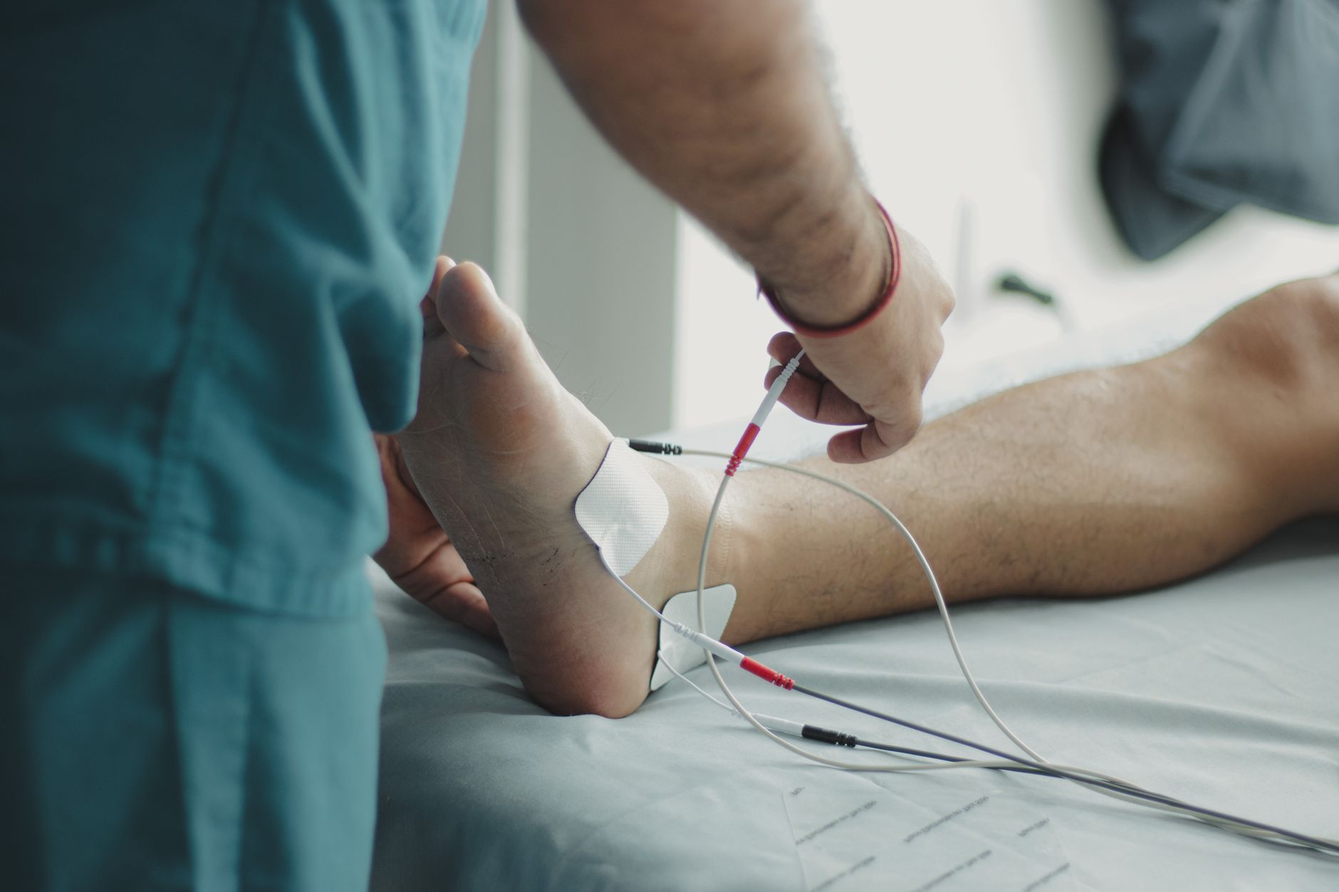 Physiotherapist treating a patient at an Auckland physical therapy clinic