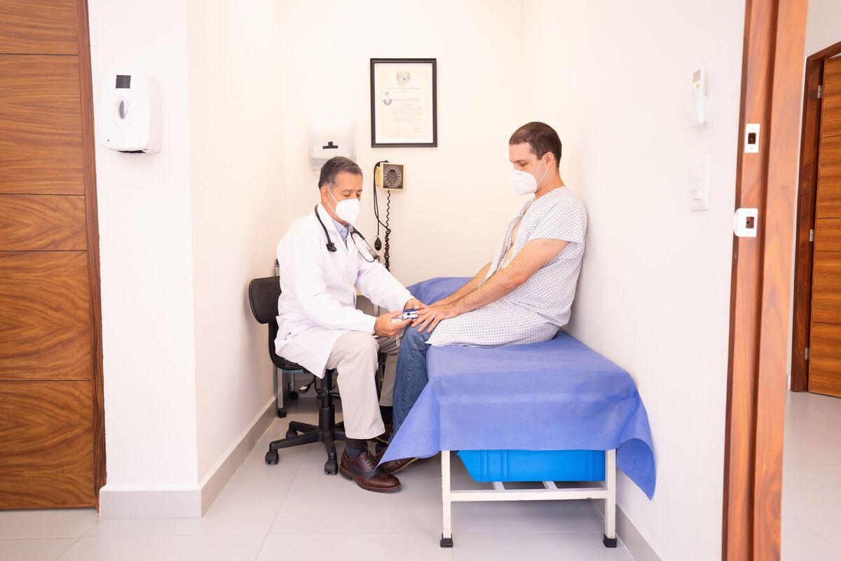 Doctor consultation with a cosmetic surgery patient in Auckland