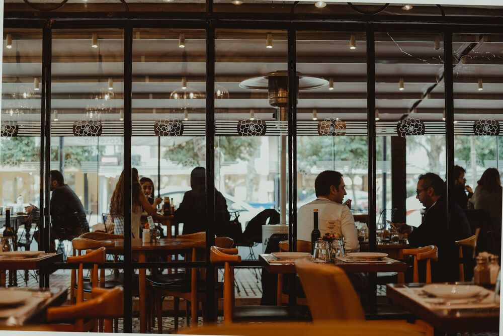 Stylish Auckland restaurant dining room set for evening service