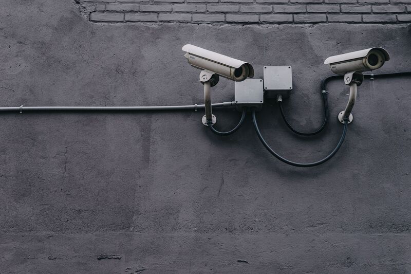 Security CCTV camera covering an Auckland building entrance