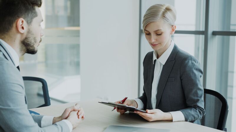 Auckland staffing agency team reviewing candidates during a hiring meeting