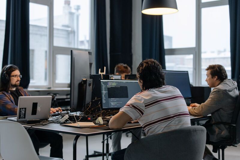 Founders collaborating at a startup workspace in Auckland