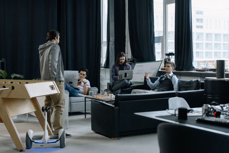 Startup founders meeting in a shared coworking space in Auckland