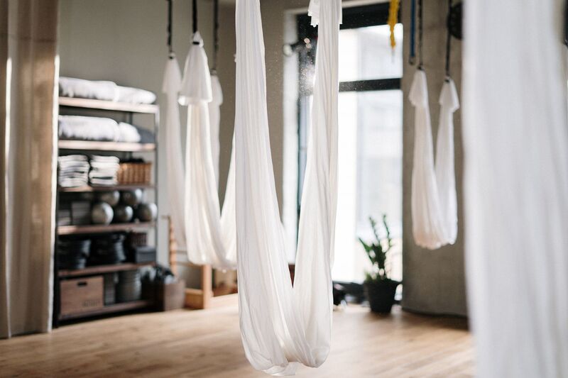 Yoga mats and props laid out in an Auckland yoga studio